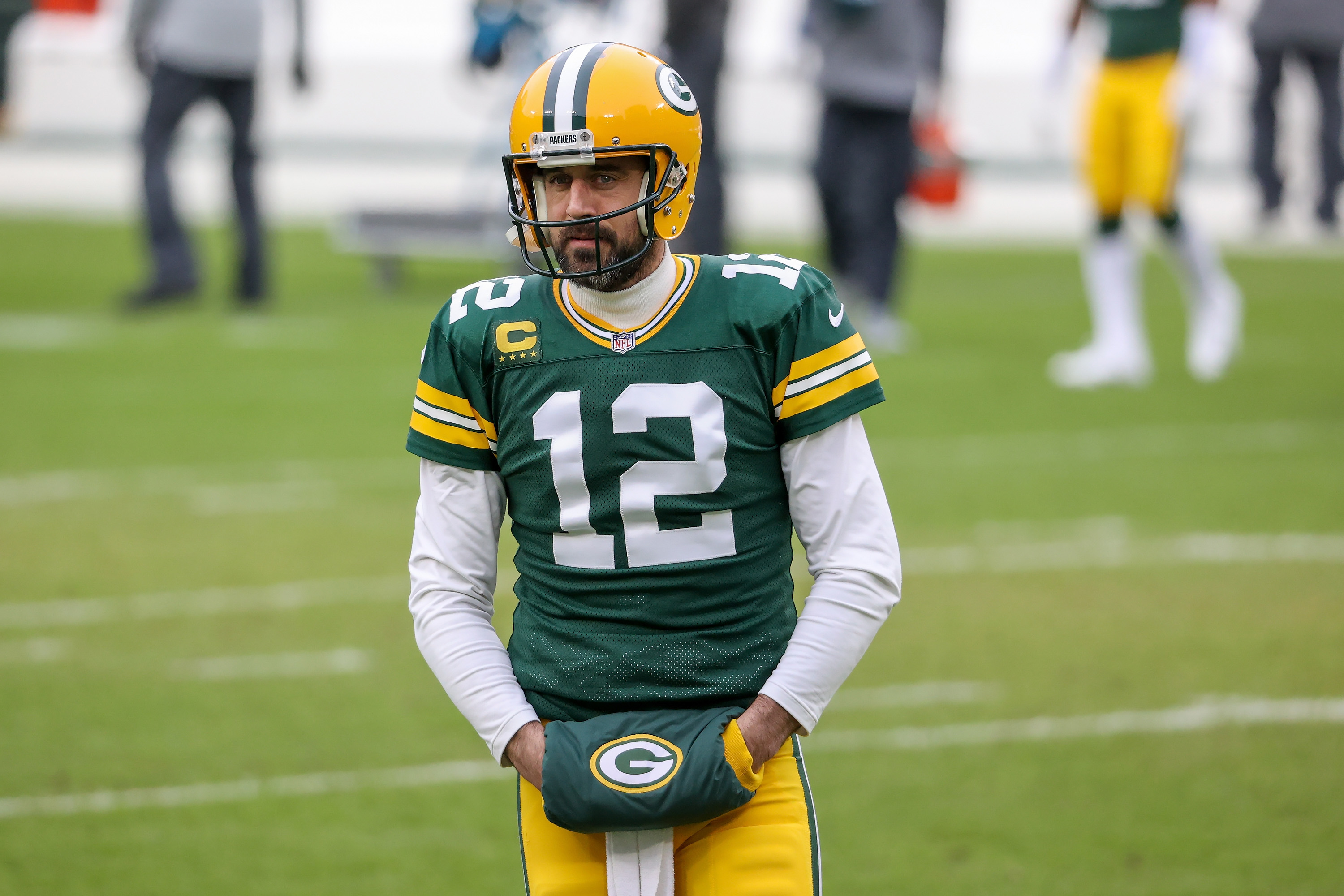 Aaron Rodgers looks on during the NFC Championship game