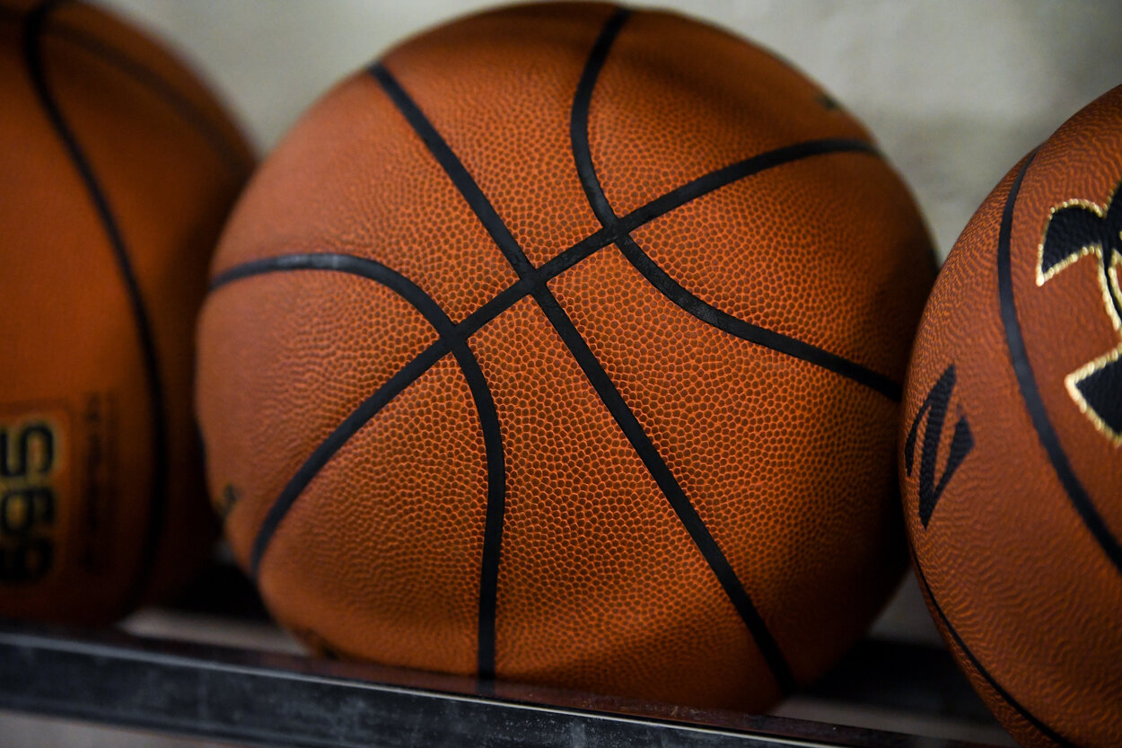 A stock image of a basketball during a college basketball game.