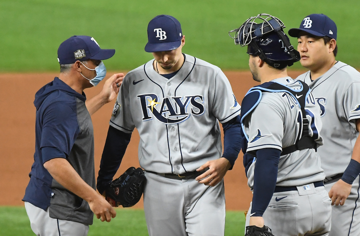 Tampa Bay Rays manager Kevin Cash takes the ball from Blake Snell