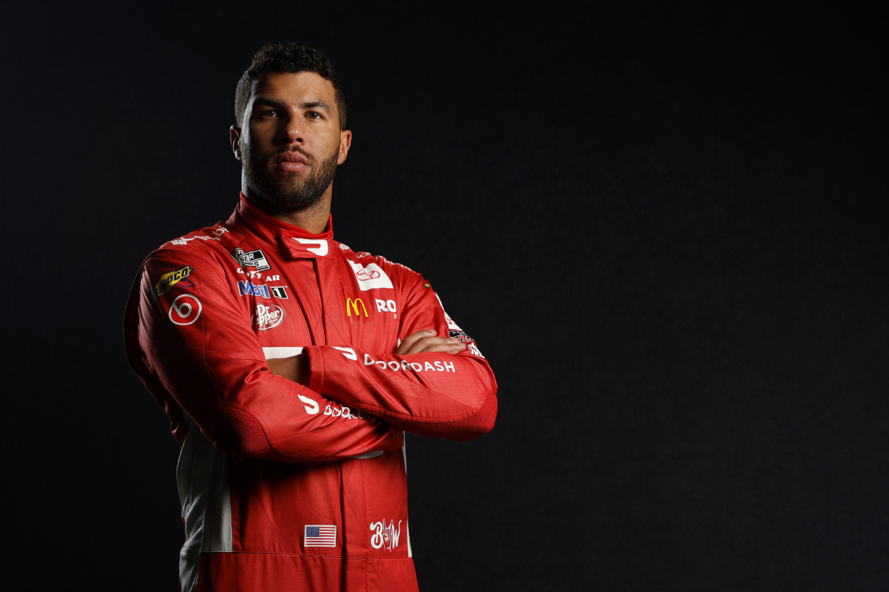 NASCAR driver Bubba Wallace poses at Daytona International Speedway.