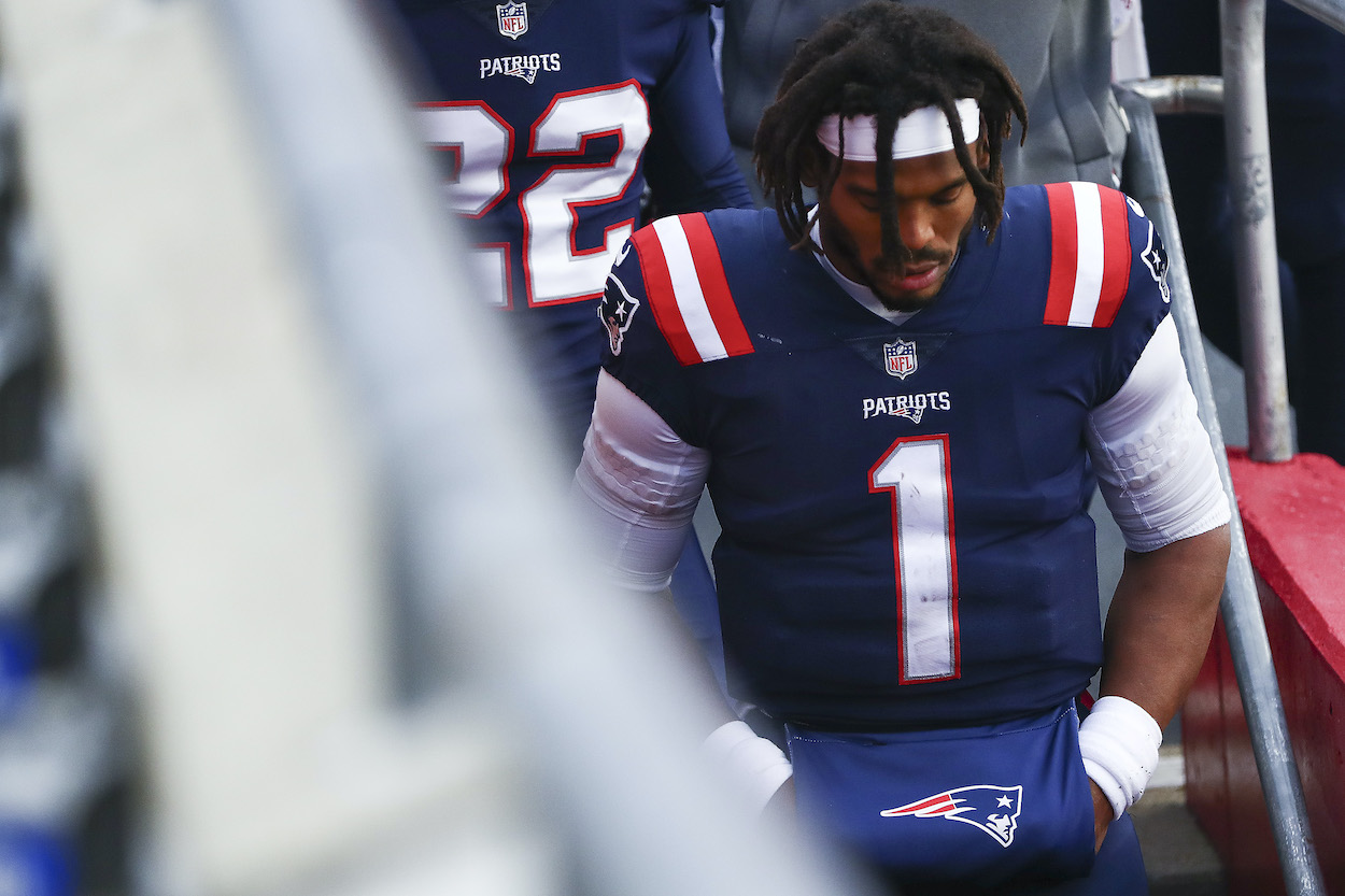 New England Patriots QB Cam Newton enters the tunnel at half time