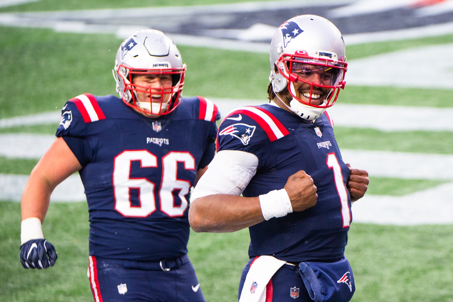 Cam Newton of the New England Patriots celebrates after scoring a touchdown against the New York Jets.