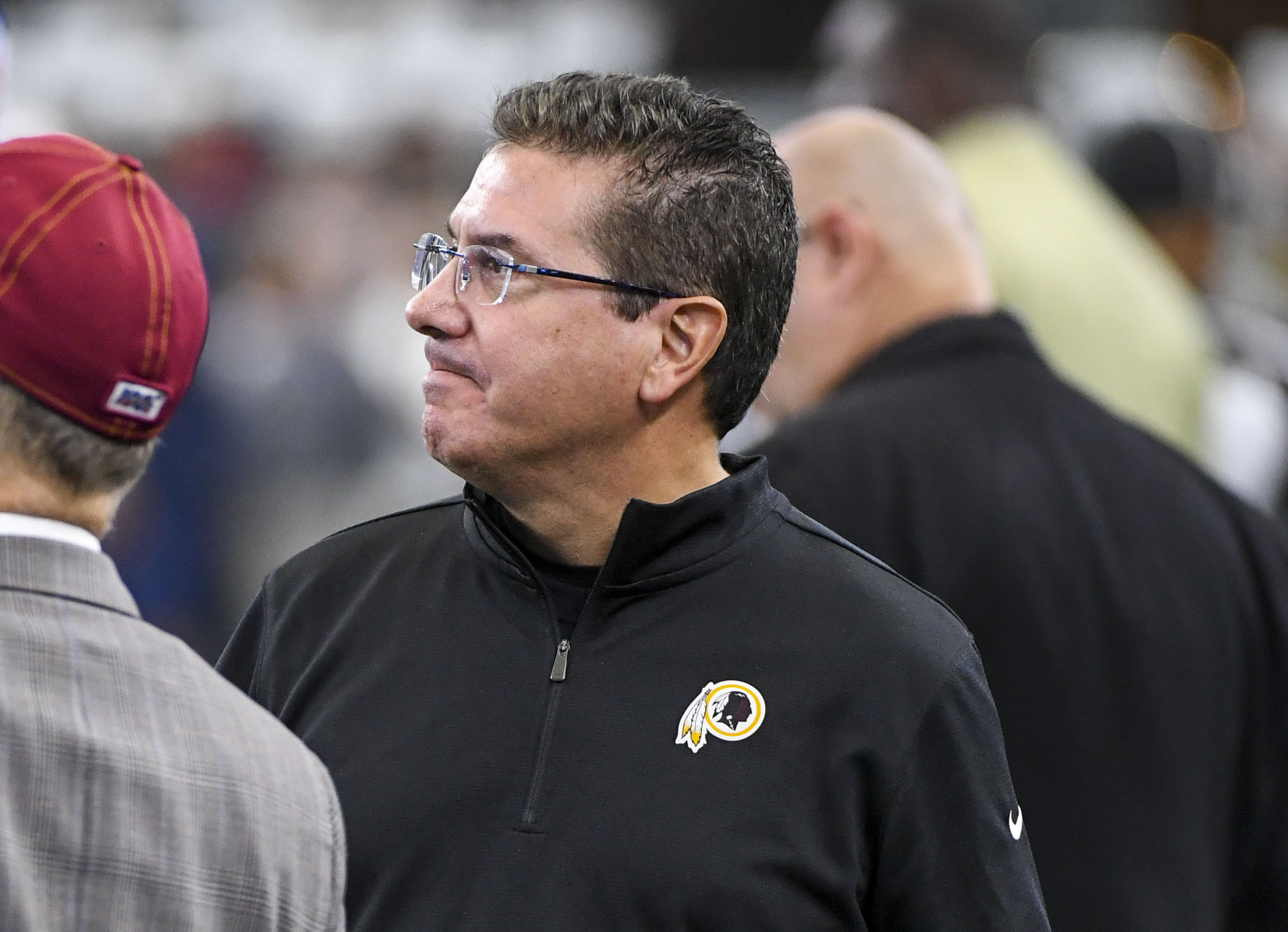 Dan Snyder watches the Washington Football Team warm up before a game