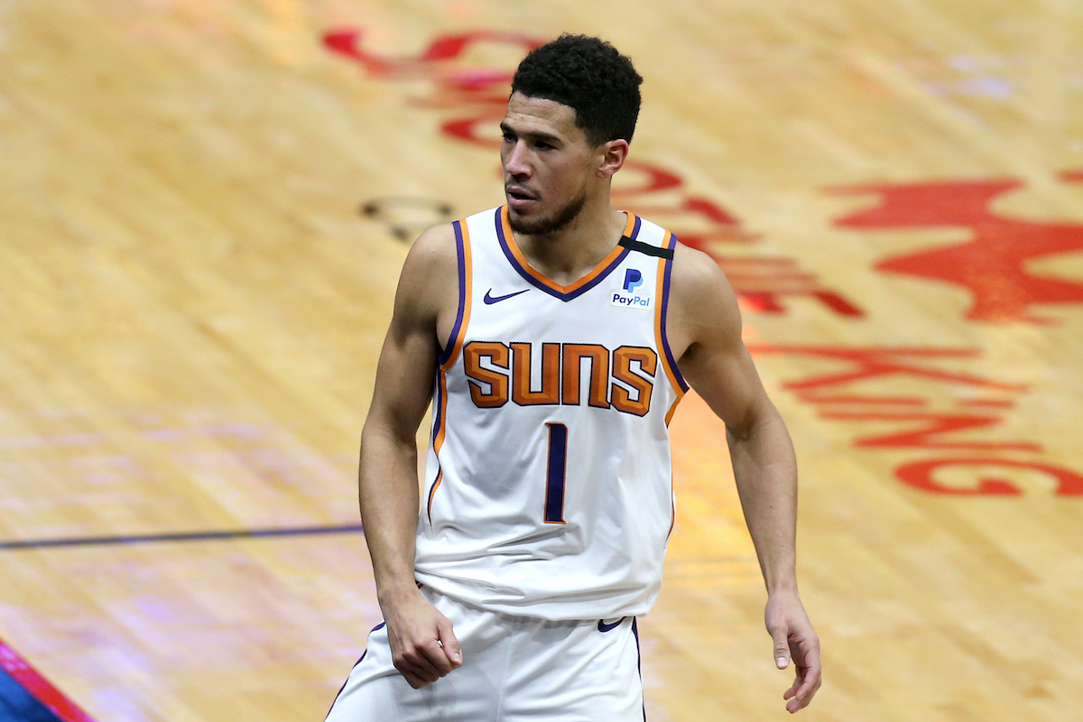 Devin Booker of the Phoenix Suns reacts after scoring