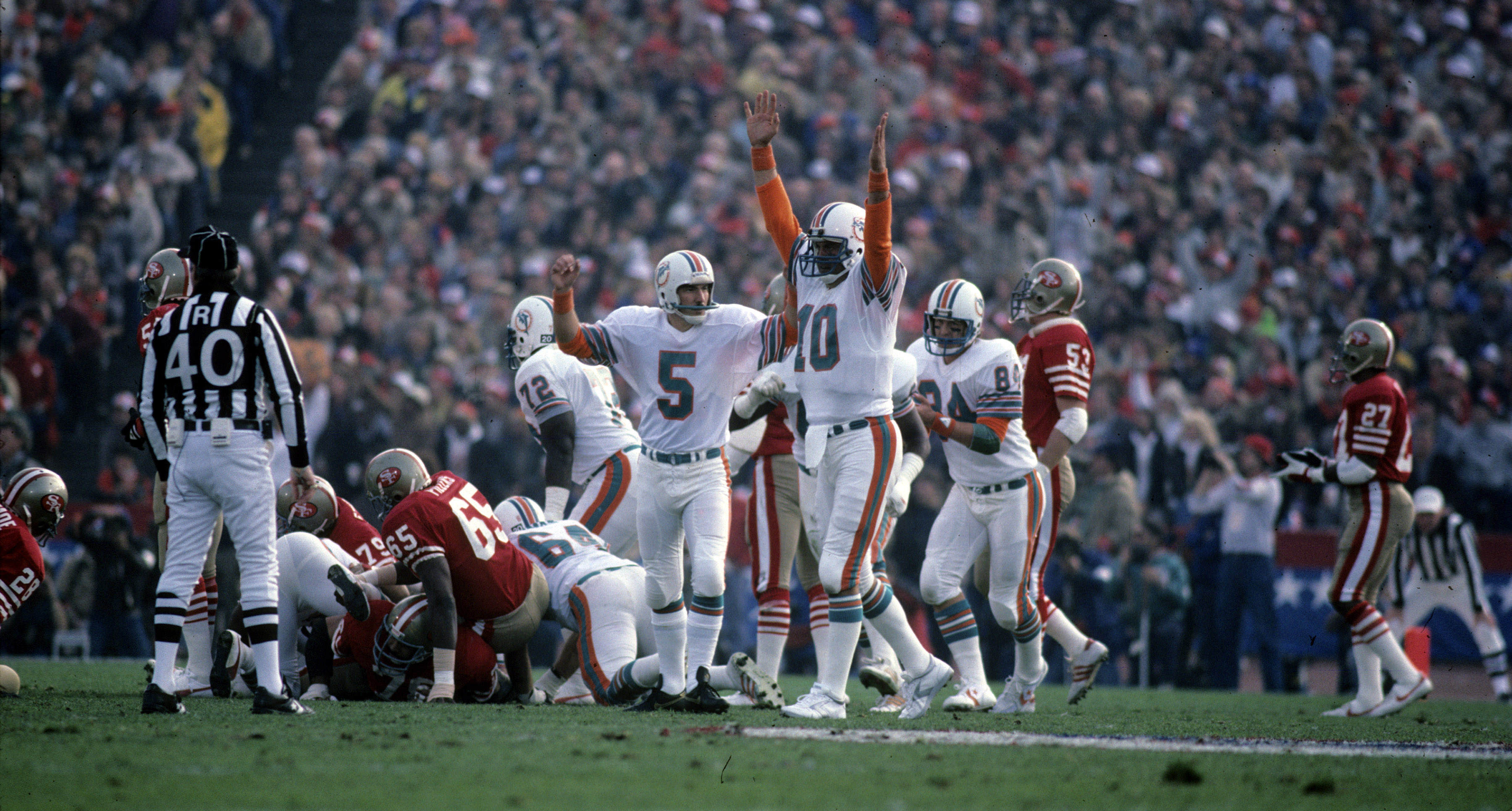 Dolphins kicker Uwe Von Schamann and holder Don Strock celebrate a field goal during Super Bowl XIX