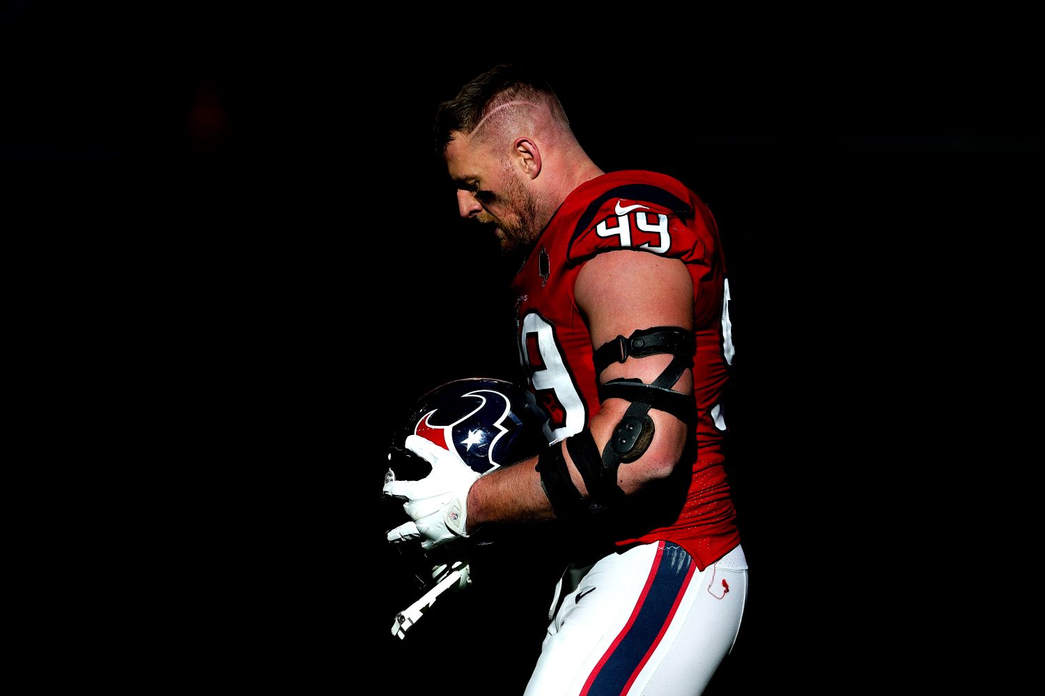 J.J. Watt of the Houston Texans looks on against the Indianapolis Colts at NRG Stadium on December 06, 2020 in Houston, Texas.