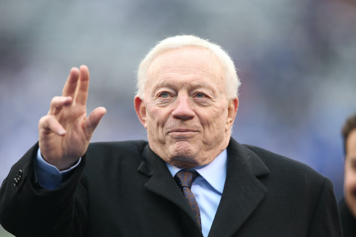 Dallas Cowboys owner Jerry Jones waves to fans before a game