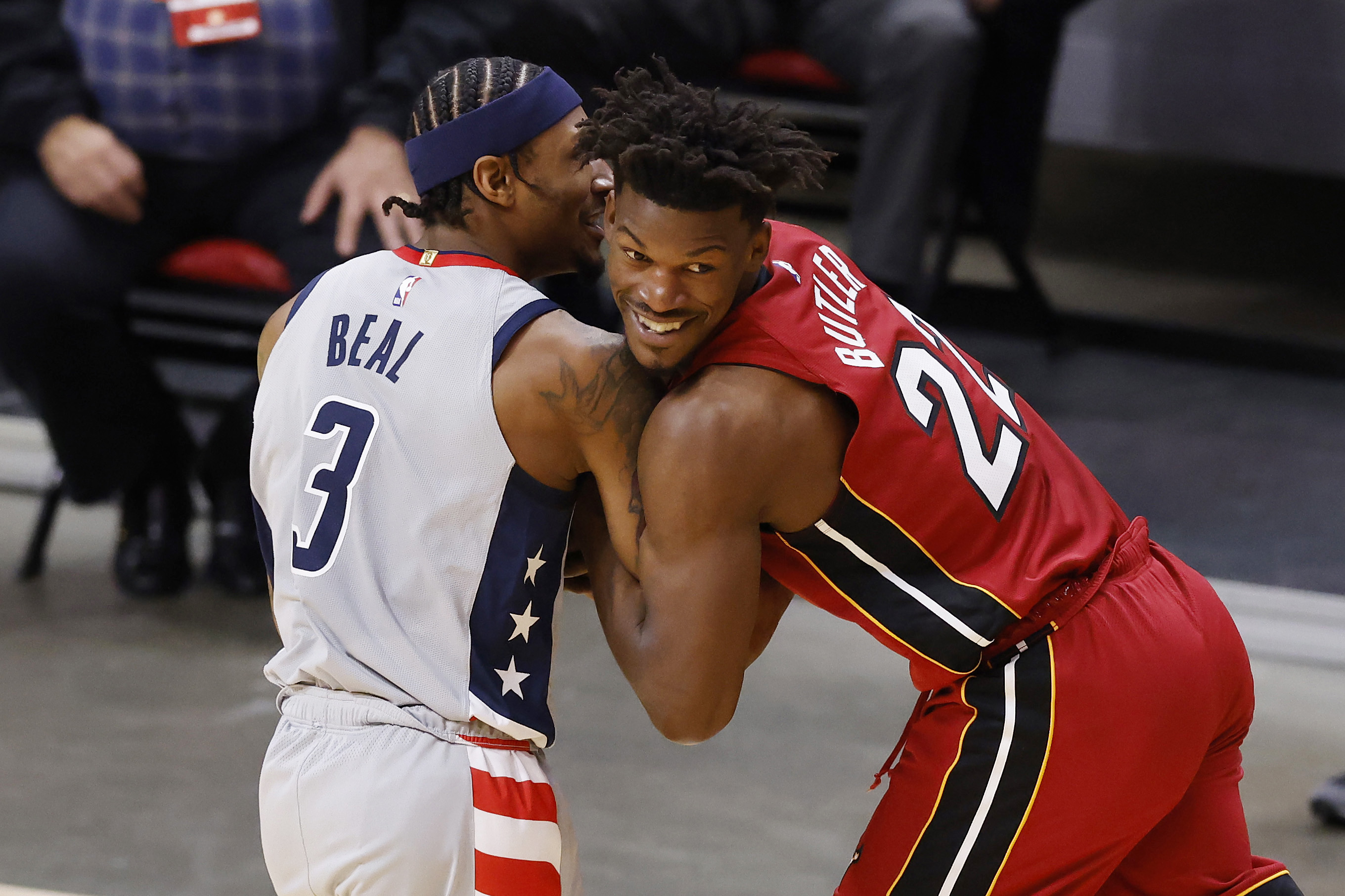 Bradley Beal of the Washington Wizards and Jimmy Butler of the Miami Heat battle for the ball