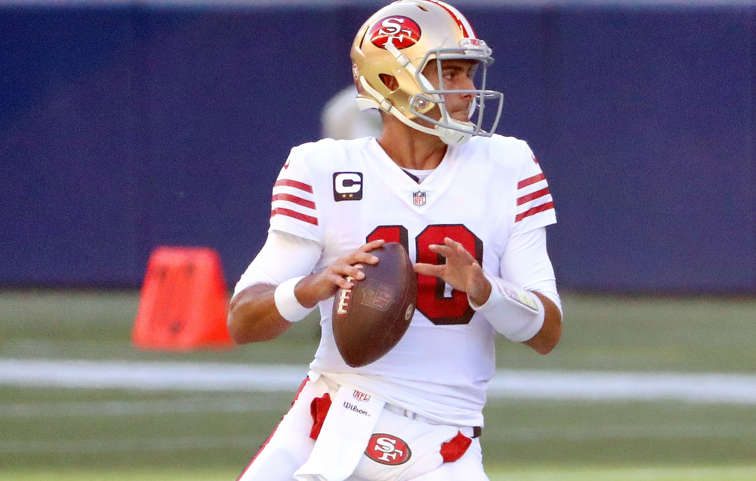 Jimmy Garoppolo of the San Francisco 49ers looks to throw the ball during a 2020 NFL game.