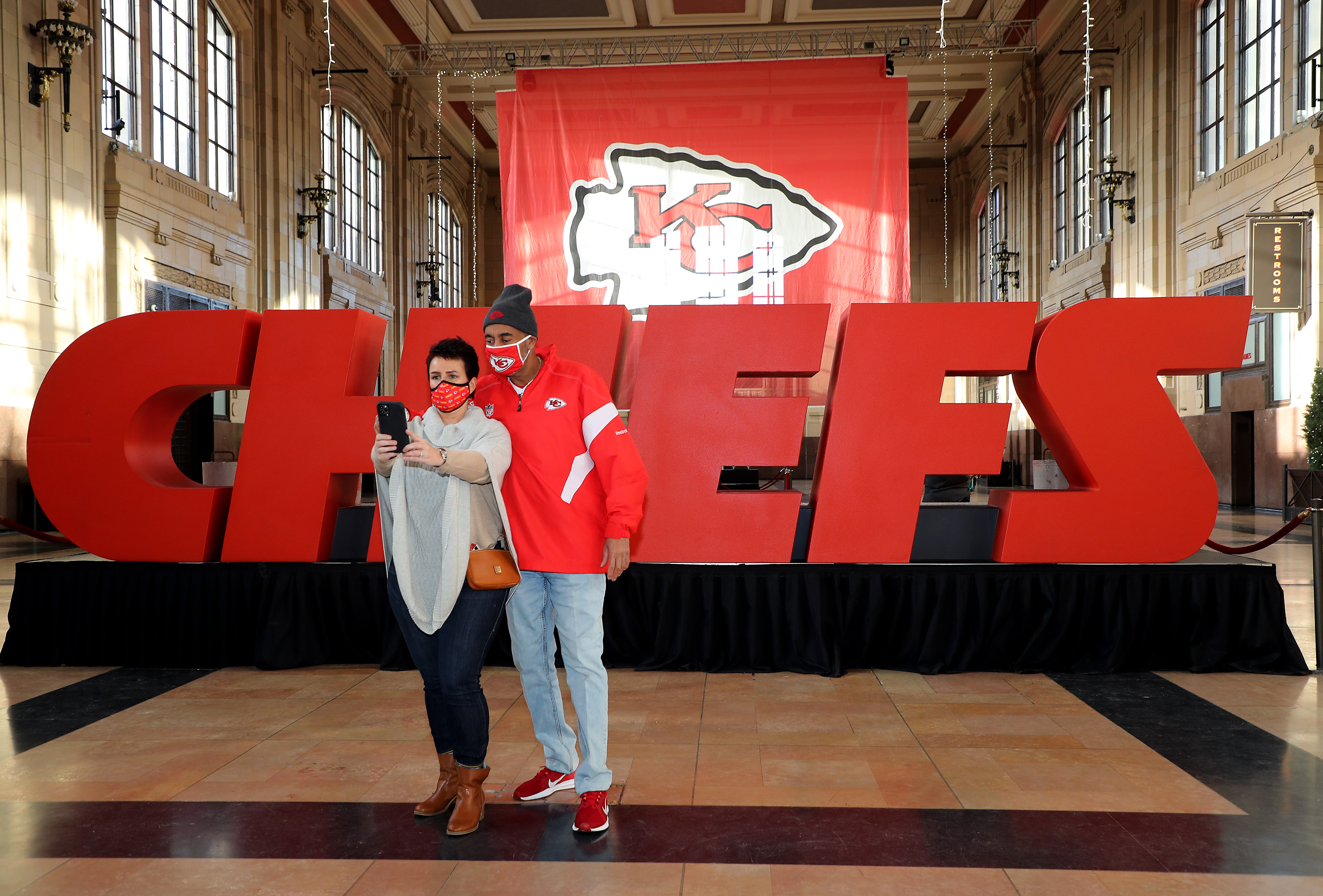Chiefs fans pose for a selfie before Super Bowl LV