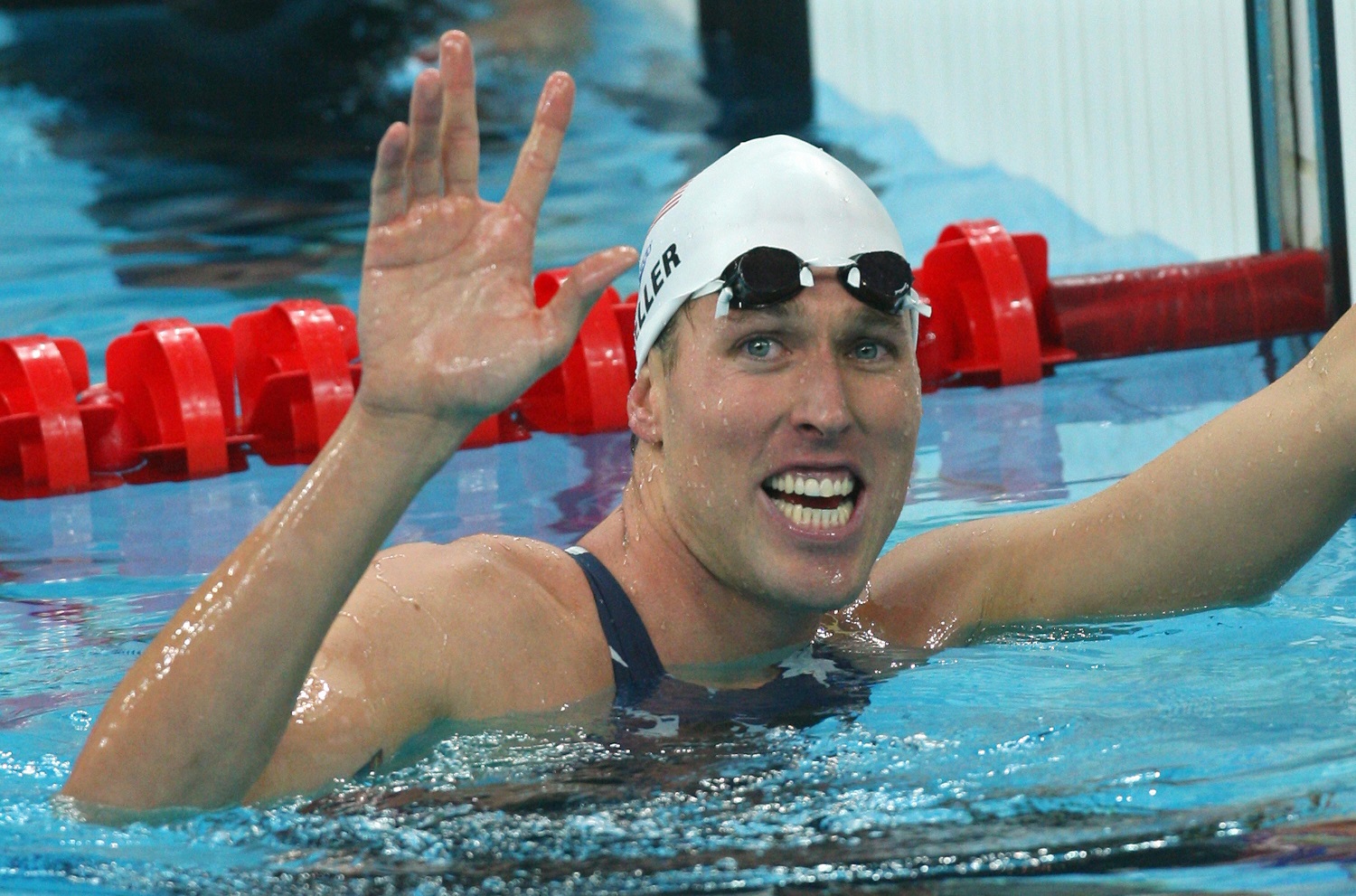 U.S. swimmer Klete Keller reacts to winning the men's 800-meter freestyle relay at the 2008 Beijing Olympic Games