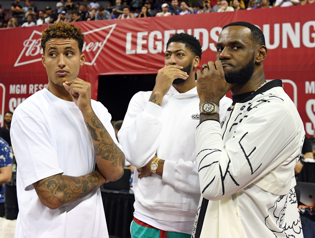 Kyle Kuzma (from left), Anthony Davis, and LeBron James of the LA Lakers talk before a 2019 Summer League game.