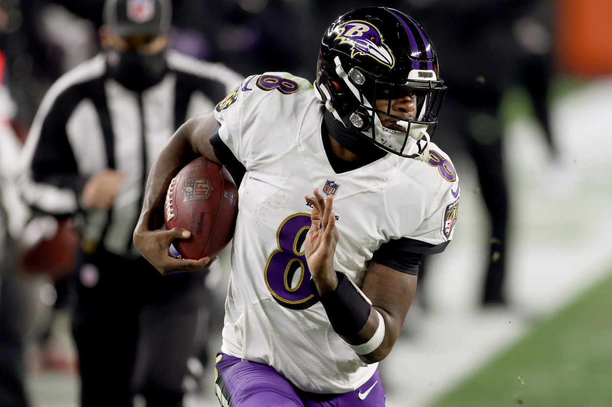 Baltimore Ravens quarterback Lamar Jackson runs the ball against the Browns.