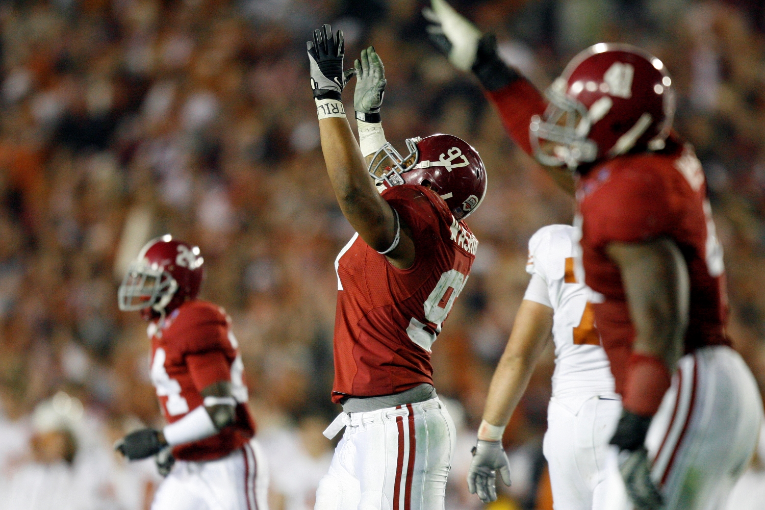 Lorenzo Washington of the University of Alabama starts to celebrate in the closing minutes of the Crimson Tide's victory over the University of Texas during the BCS National Championship.