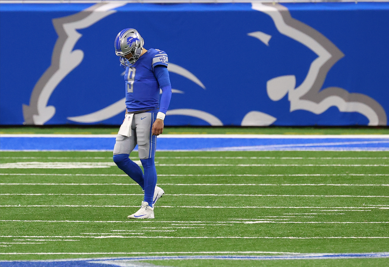 Former Detroit Lions quarterback Matthew Stafford walks off Ford Field against the Minnesota Vikings