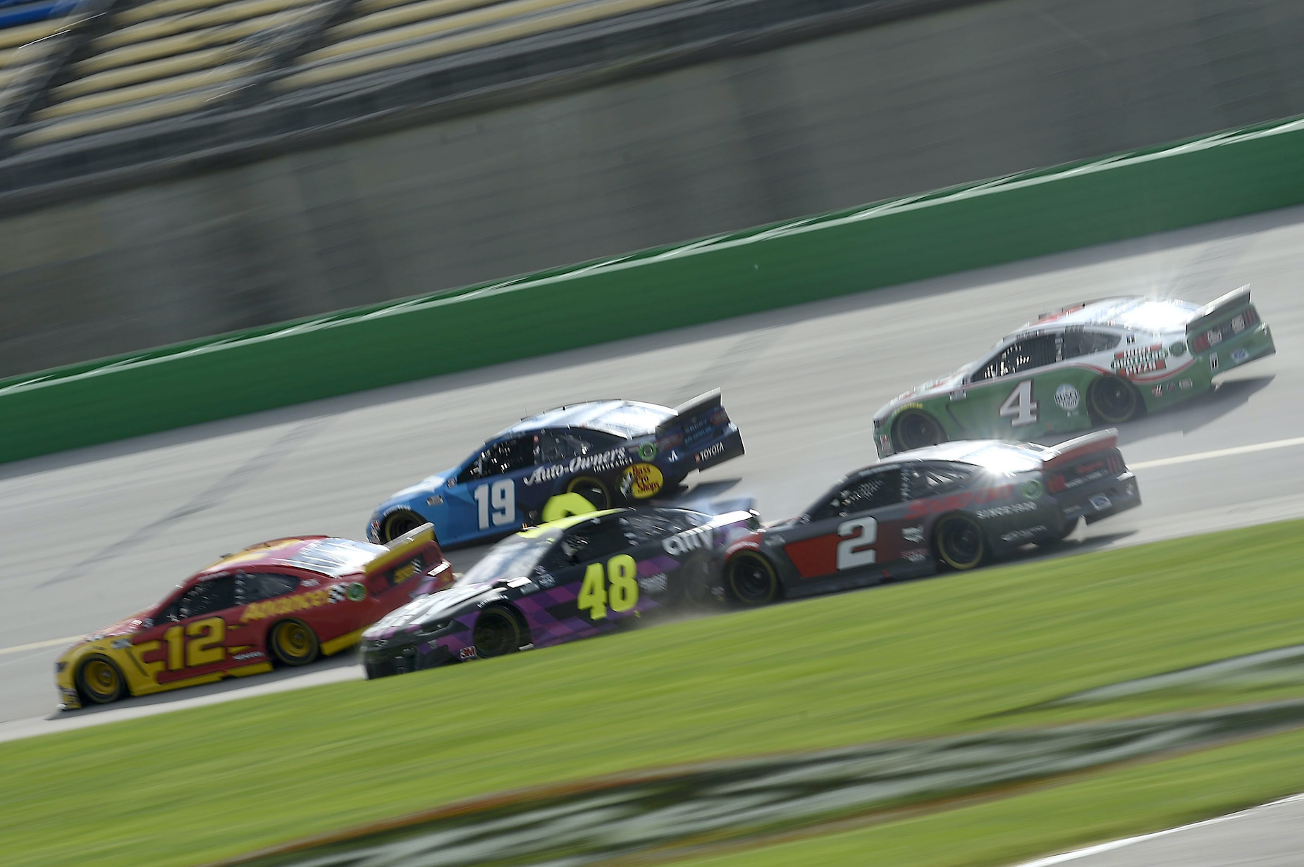 Why do NASCAR races only turn left?