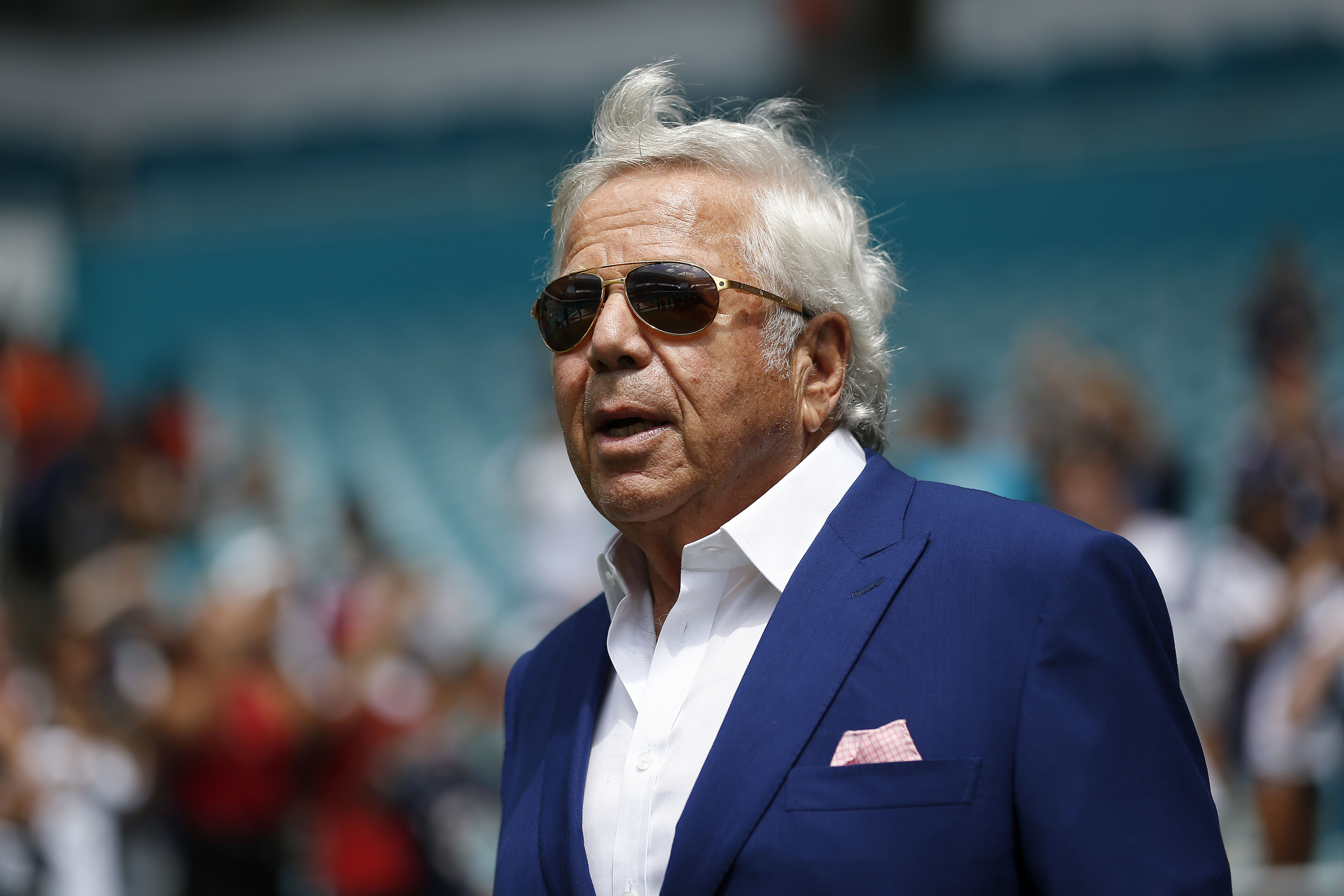 New England Patriots CEO Robert Kraft walks to the field prior to a game