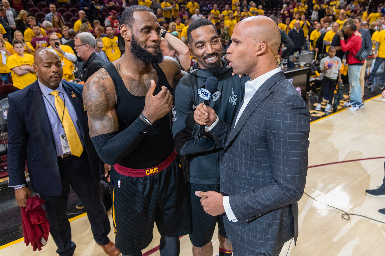 LeBron James talks with former teammate Richard Jefferson.