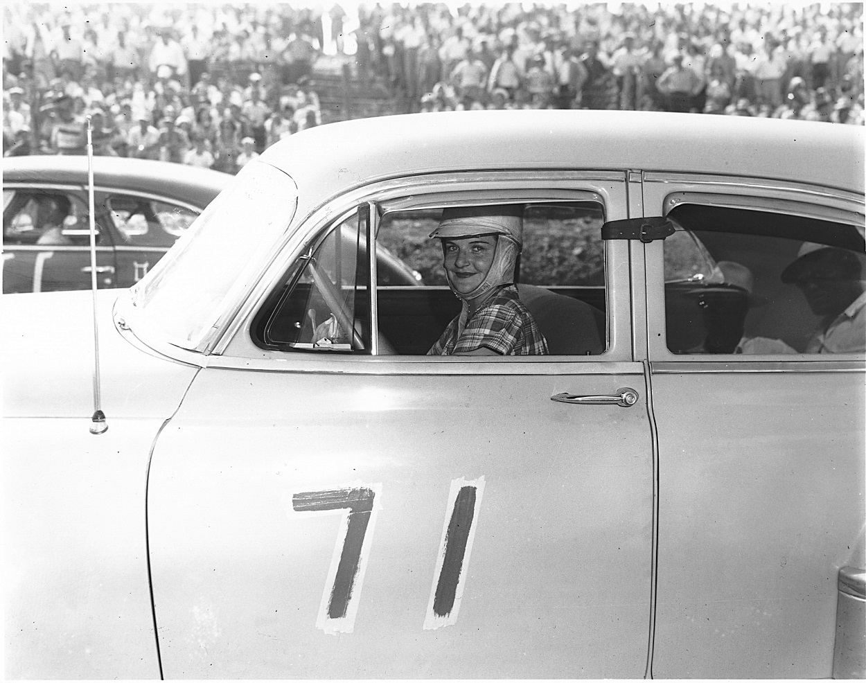 Sara Christian prepares for a 1949 NASCAR race