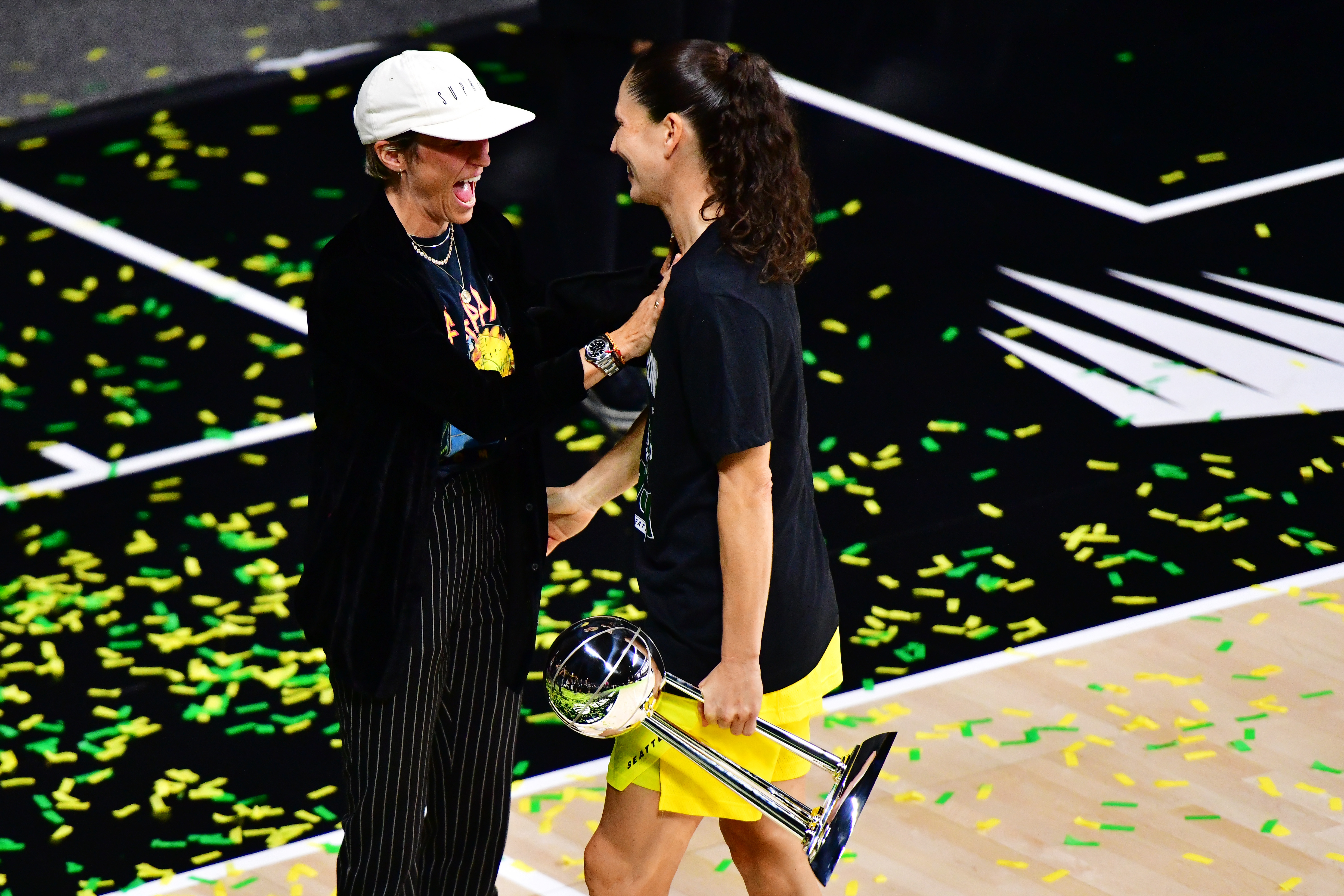 Sue Bird of the Seattle Storm celebrates with Megan Rapinoe after winning the WNBA Championship