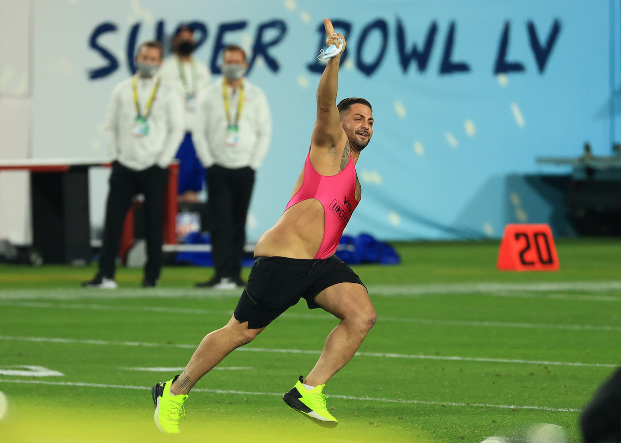 Super Bowl streaker celebrates on the field during the fourth quarter