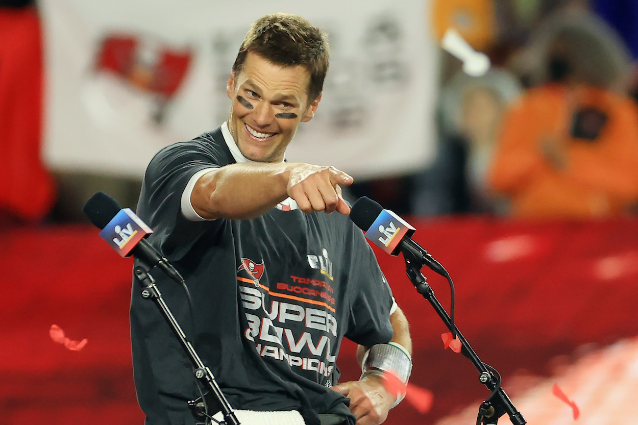 Tampa Bay Buccaneers quarterback Tom Brady points in the direction of a teammate after Super Bowl 55
