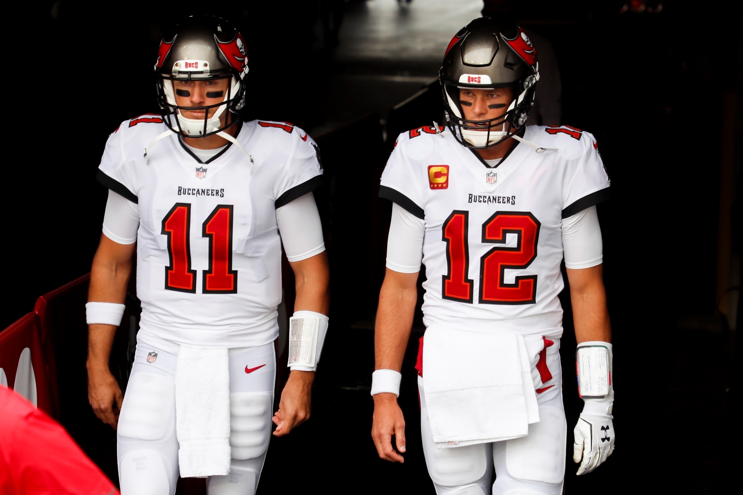 Tom Brady and Blaine Gabbert of the Tampa Bay Buccaneers enter the field before the start of a game against the Los Angeles Chargers.