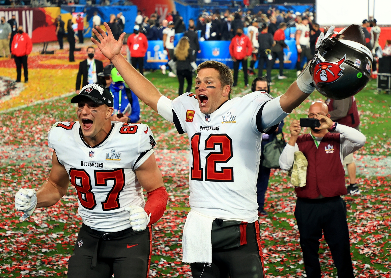 Rob Gronkowski and Tom Brady of the Tampa Bay Buccaneers celebrate after defeating the Kansas City Chiefs in Super Bowl 55.