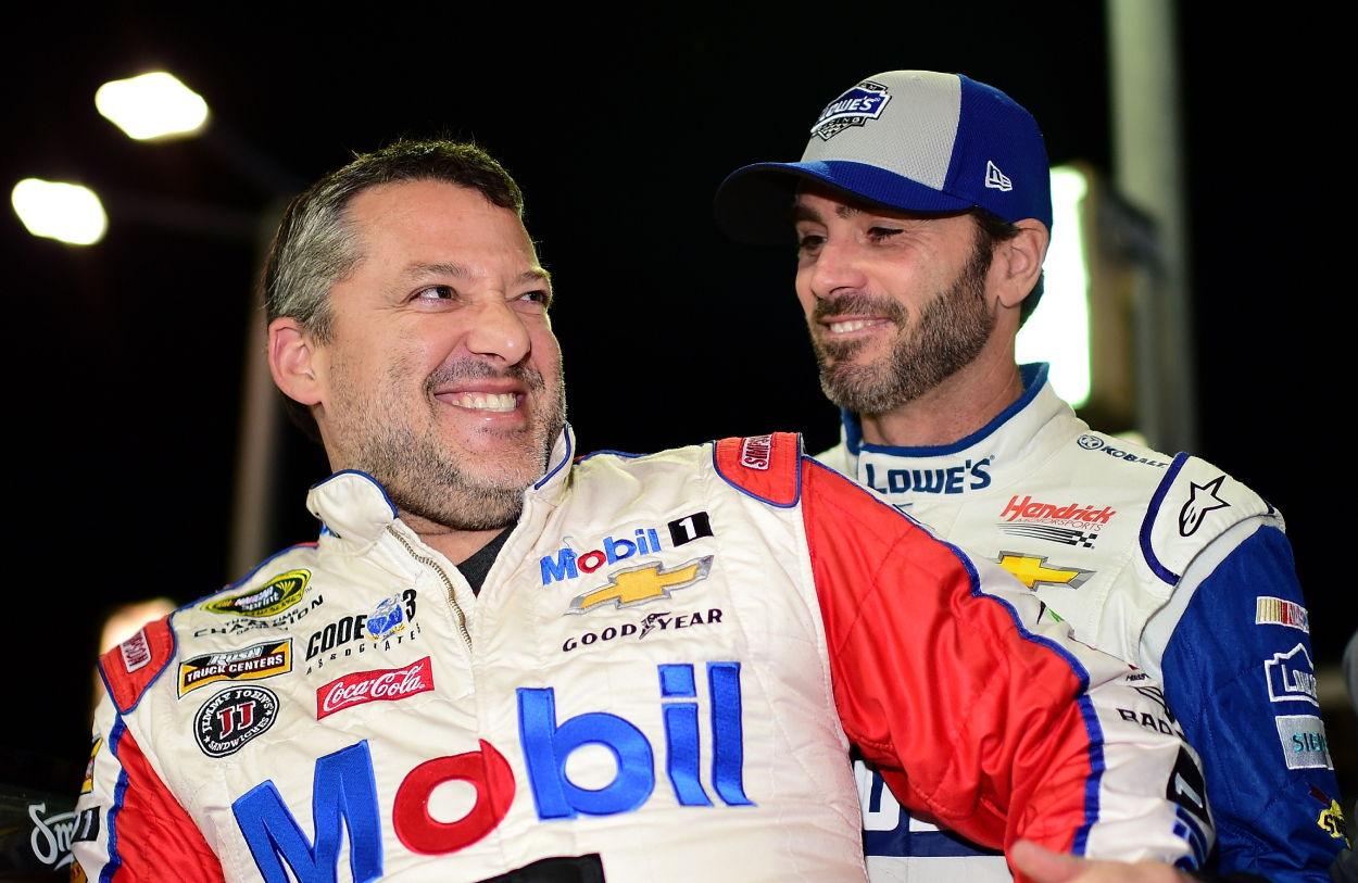 Tony Stewart and Jimmie Johnson during qualifying for the EcoBoost 400.