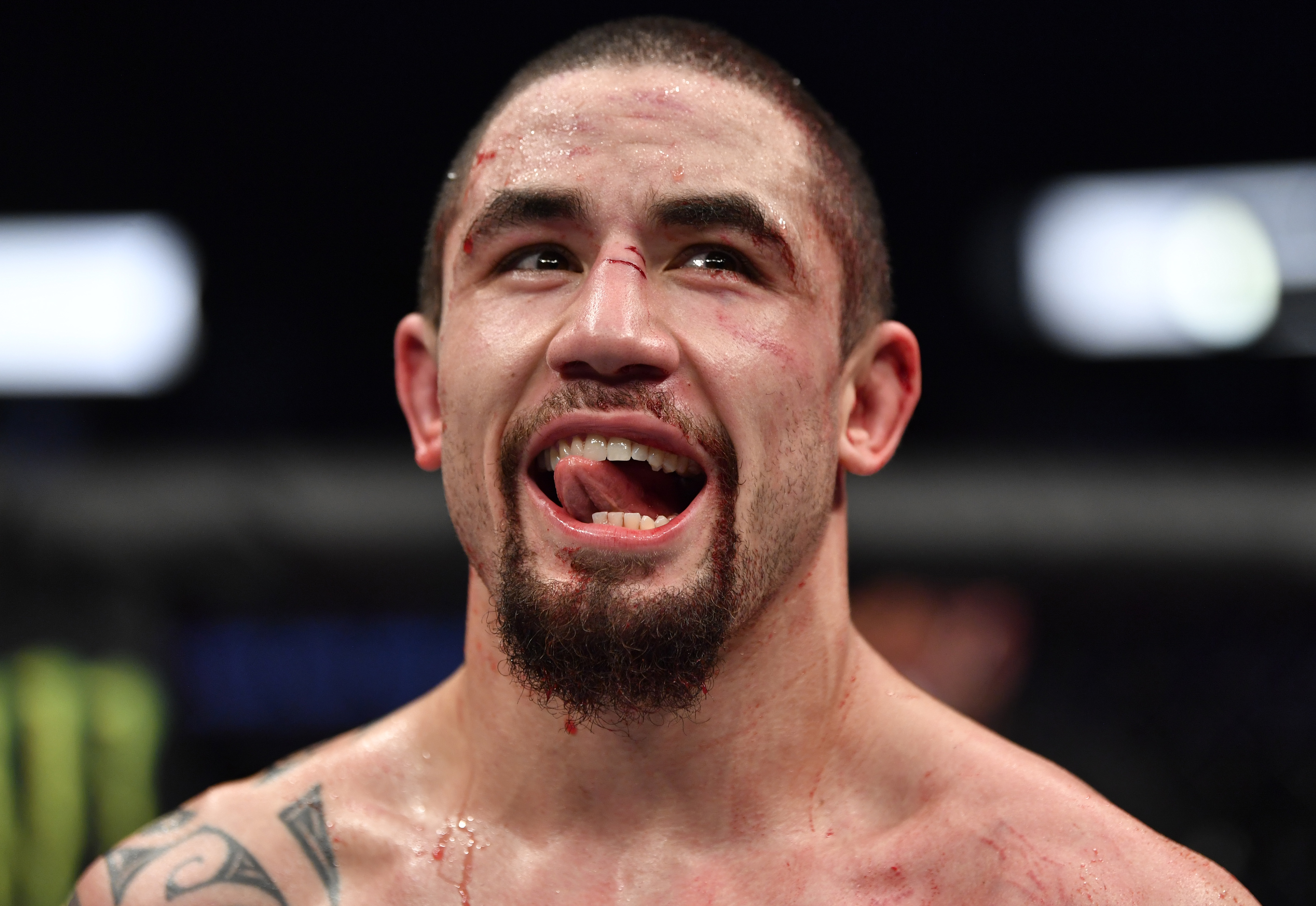 Robert Whittaker reacts after the conclusion of his middleweight fight against Darren Till