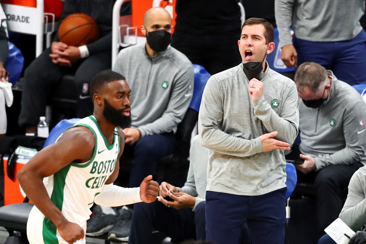 Head Coach Brad Stevens of the Boston Celtics lowers his mask to speak during a game against the Los Angeles Clippers at TD Garden on March 2, 2021.