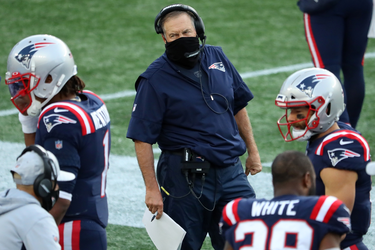 Patriots head coach Bill Belichick looks toward Cam Newton during a game against the San Francisco 49ers on Oct. 25, 2020.