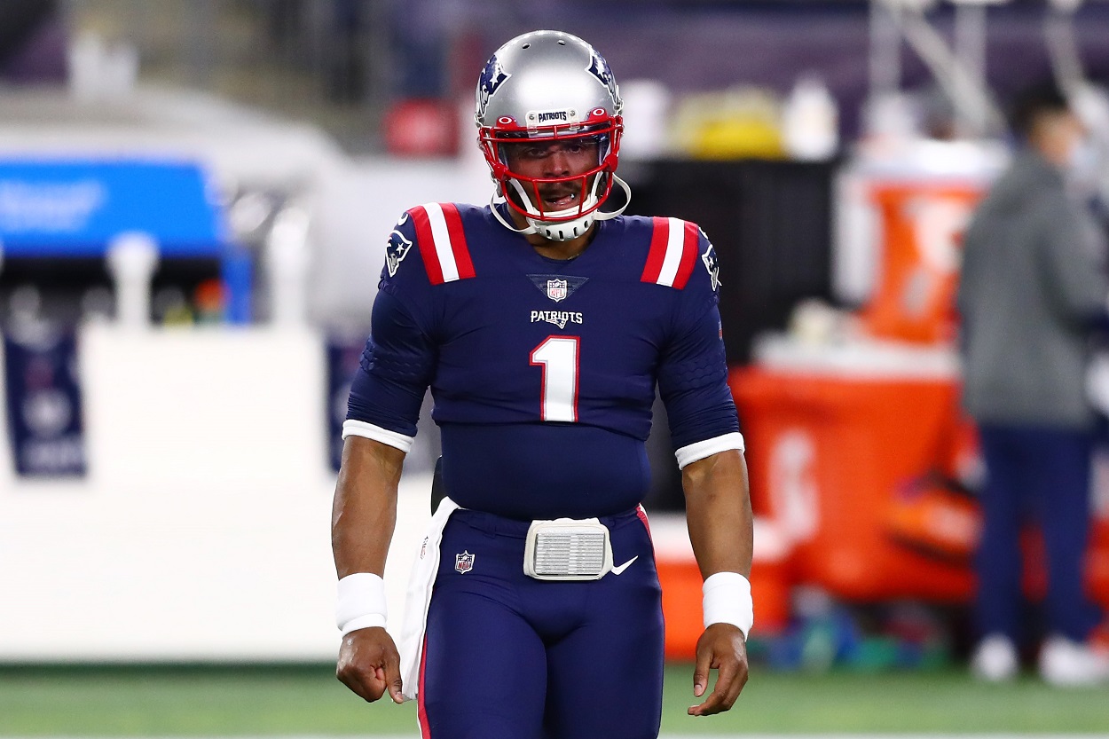 Patriots quarterback Cam Newton takes the field during warmups last season.