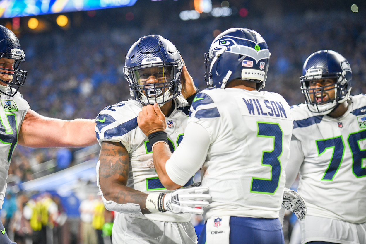 Seattle Seahawks teammates Chris Carson and Russell Wilson