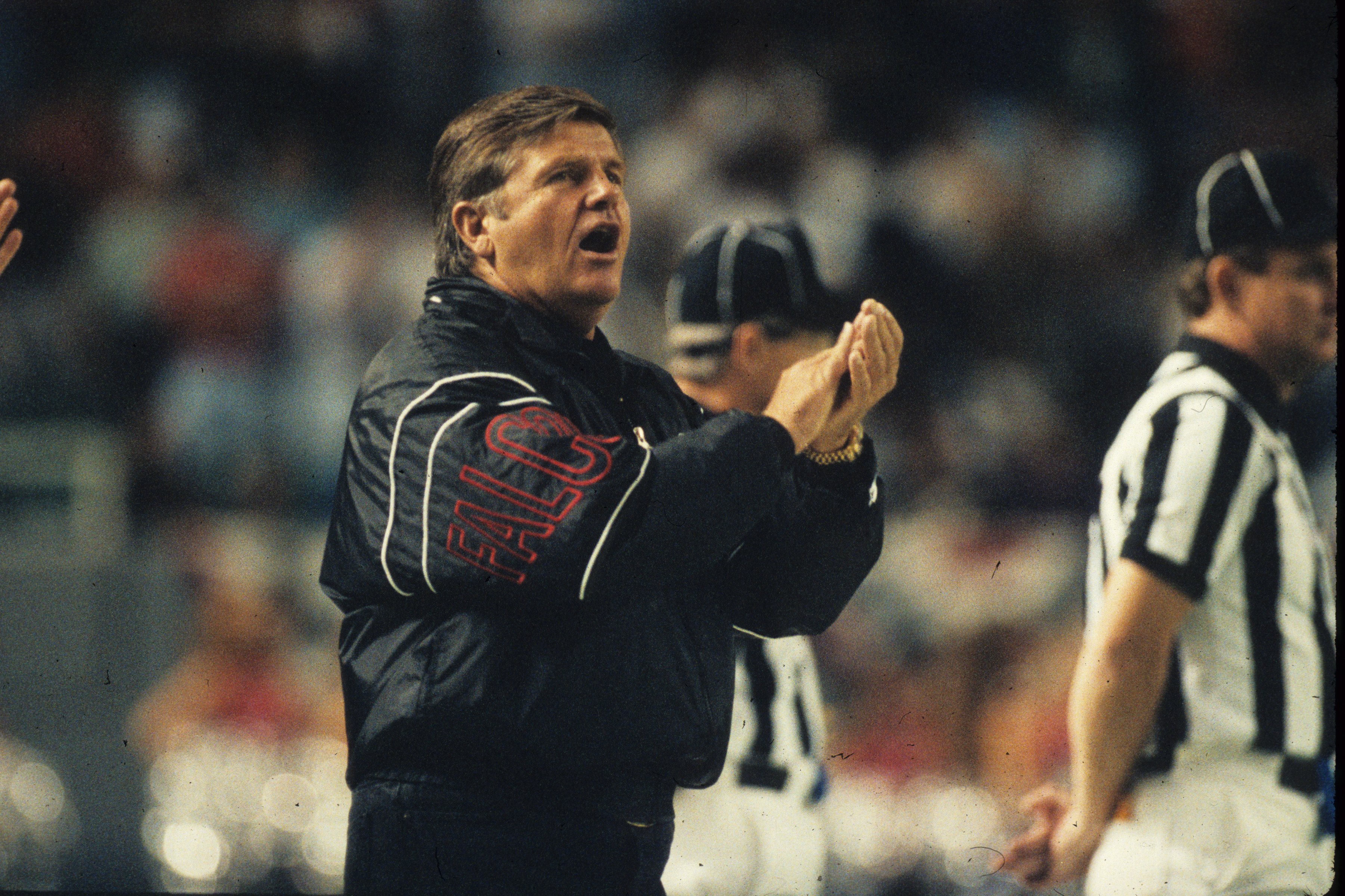 Jerry Glanville of the Atlanta Falcons encourages