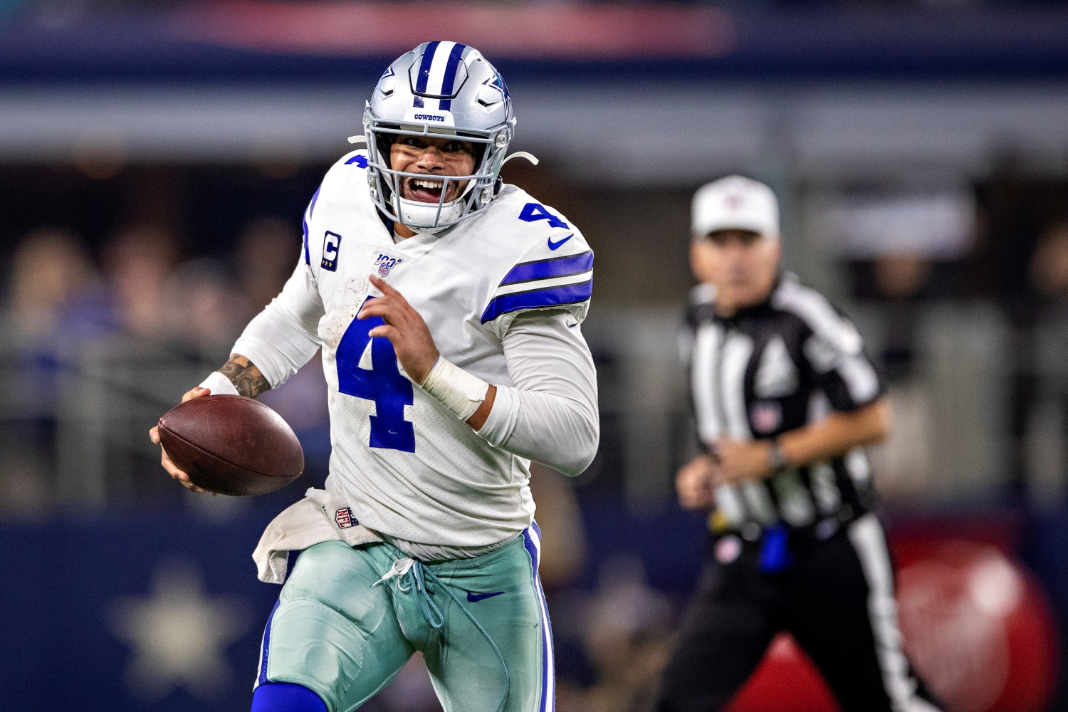 Dak Prescott of the Dallas Cowboys runs the ball against the Buffalo Bills on Nov. 28, 2019.