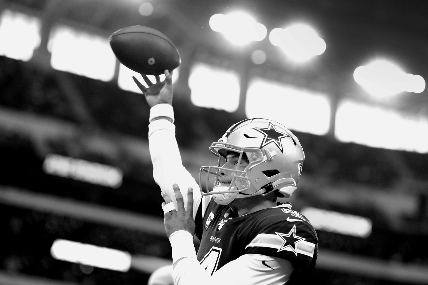 Dak Prescott warms up for the Dallas Cowboys before a game against the LA Rams in 2019.
