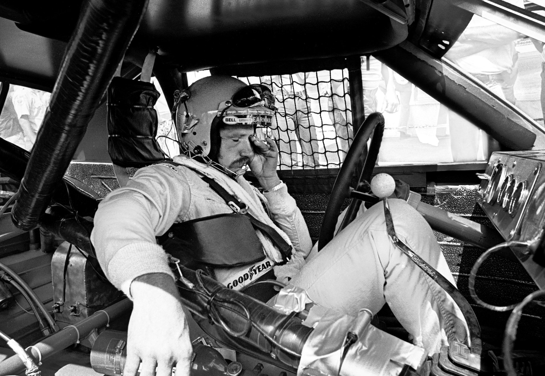 NASCAR legend Dale Earnhardt sits in the driver's seat
