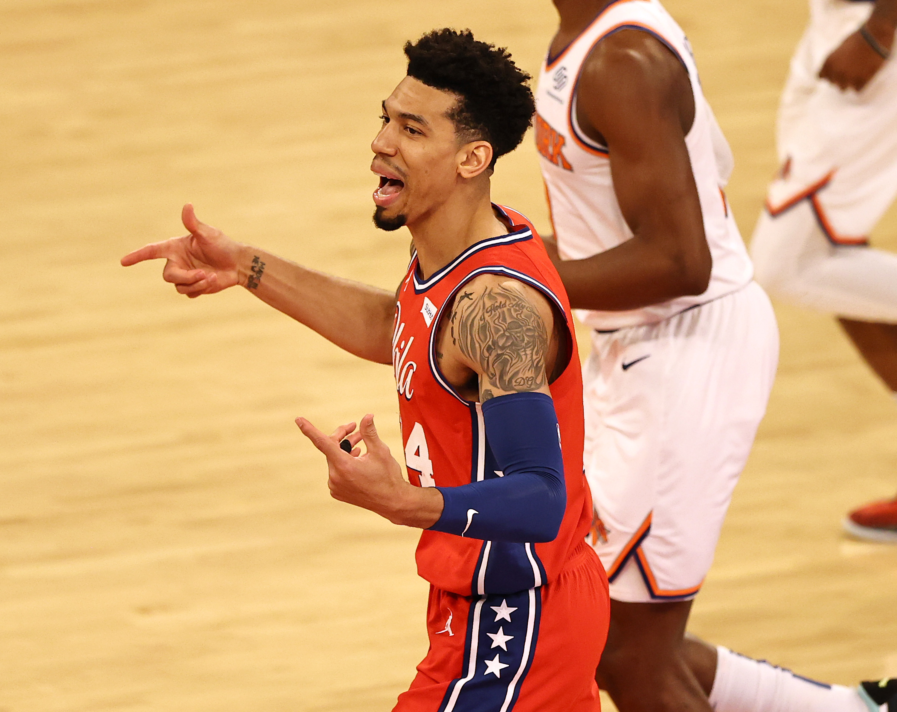 Danny Green of the Philadelphia 76ers celebrates a three-point shot