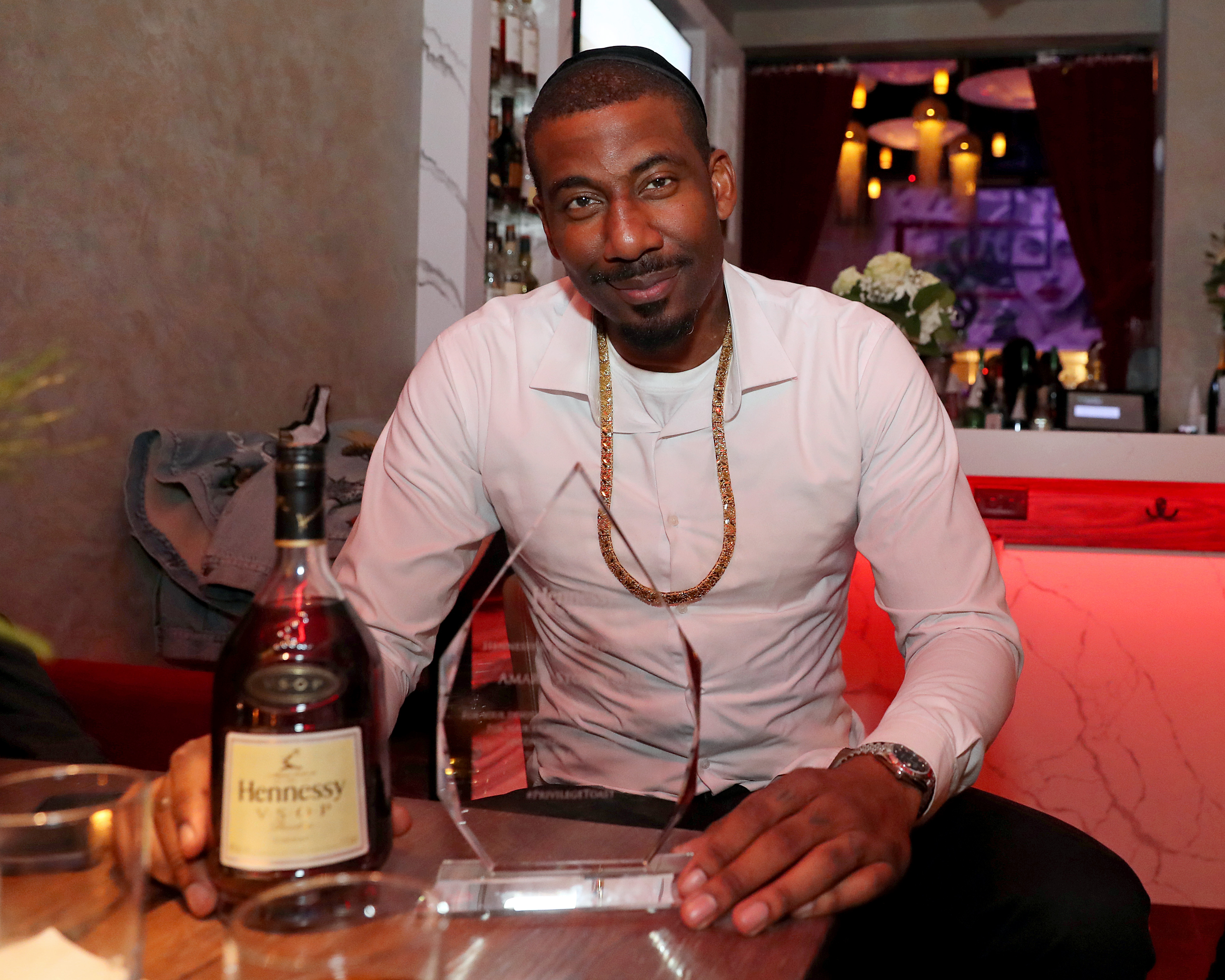 Amar'e Stoudemire poses during a Hennessy toast in 2021