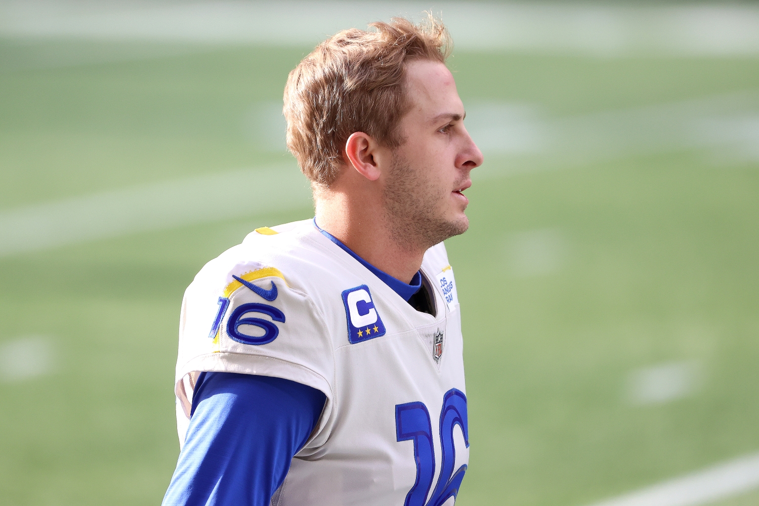 Jared Goff of the LA Rams looks toward the field before a playoff game against the Seattle Seahawks.