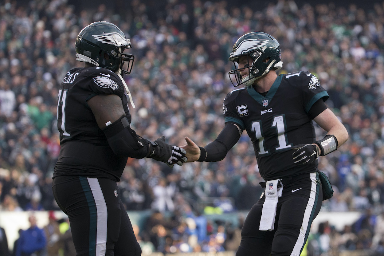 Jason Peters and Carson Wentz shake hands