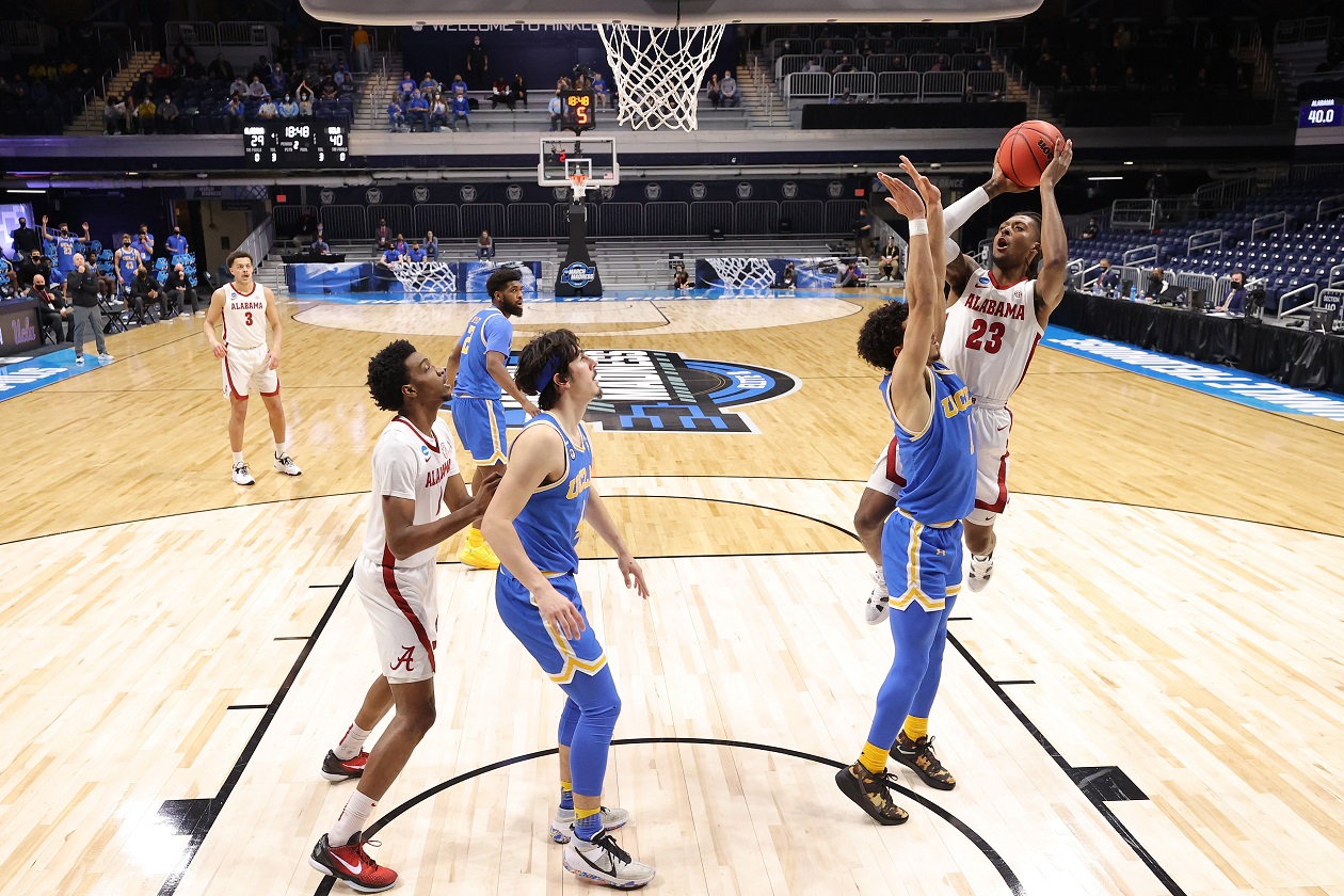 Alabama's John Petty Jr. goes up for a bucket