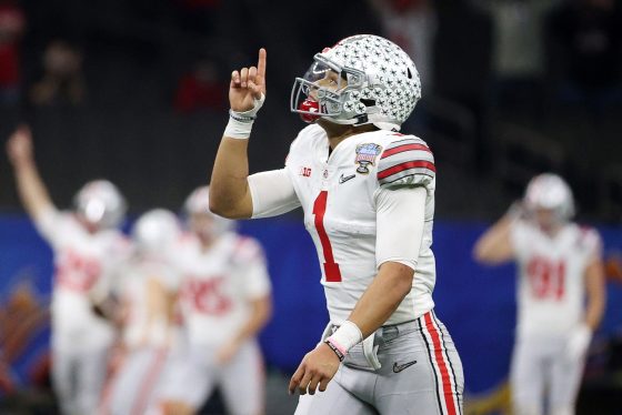 Ohio State quarterback Justin Fields reacts after throwing a touchdown pass during the 2021 College Football Playoff semifinal on New Year's Day.