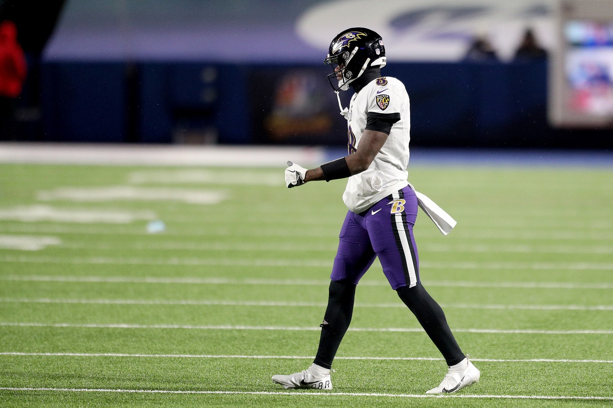 Baltimore Ravens QB Lamar Jackson walks onto the field