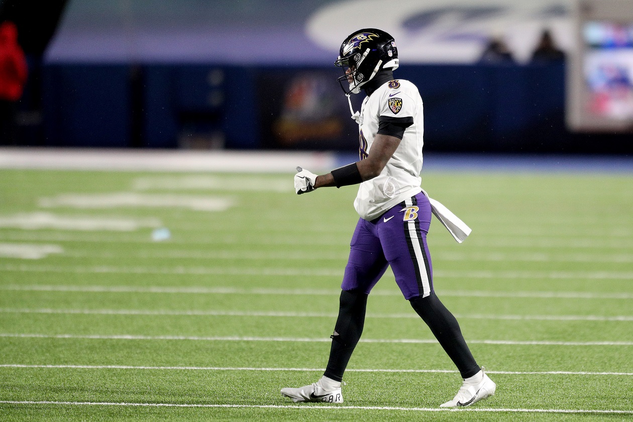 Baltimore Ravens QB Lamar Jackson walks onto the field