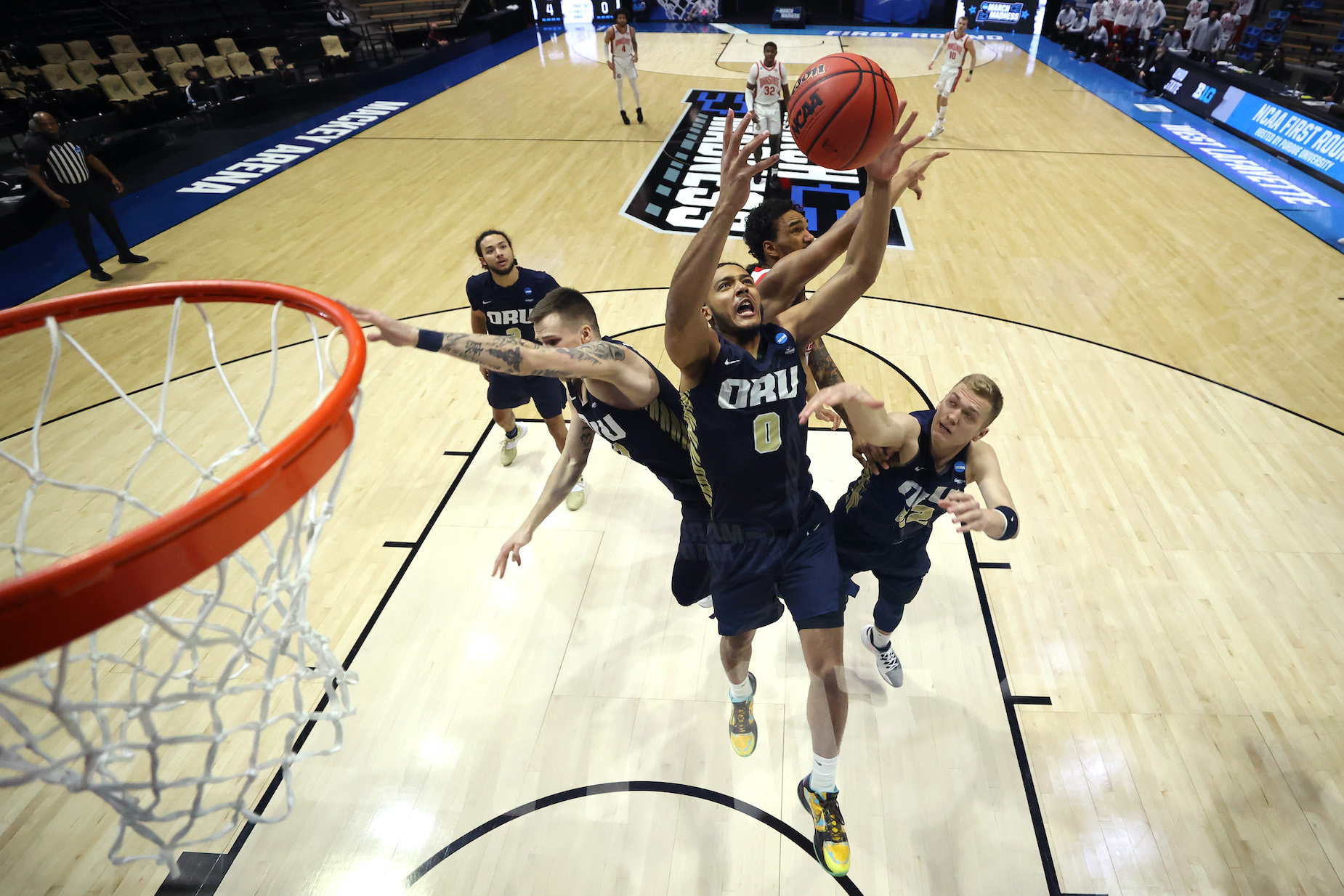 The Oral Roberts University Golden Eagles control a rebound during the NCAA Tournament.