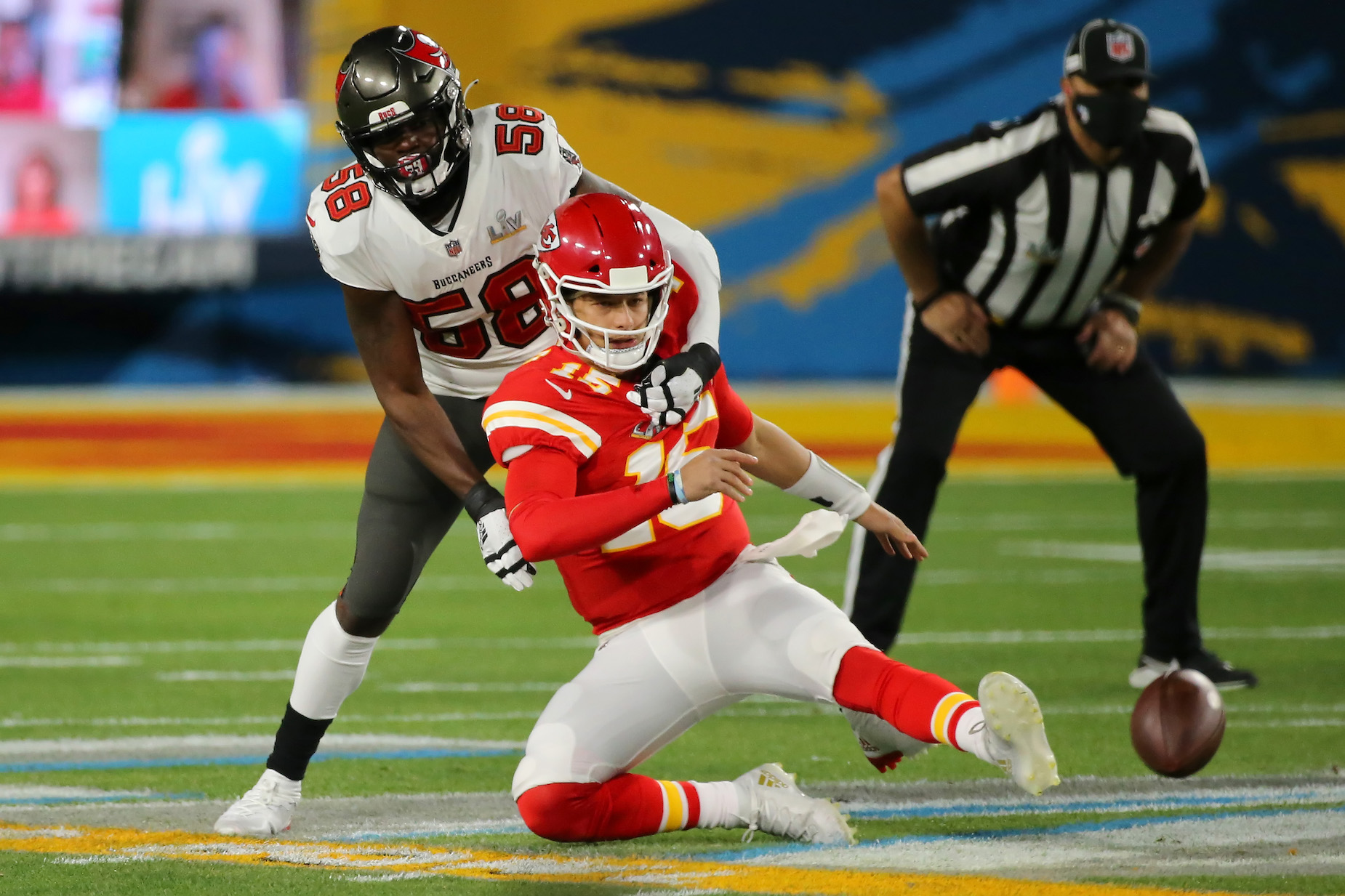 Patrick Mahomes of the Kansas City Chiefs is taken to the ground during Super Bowl 55.