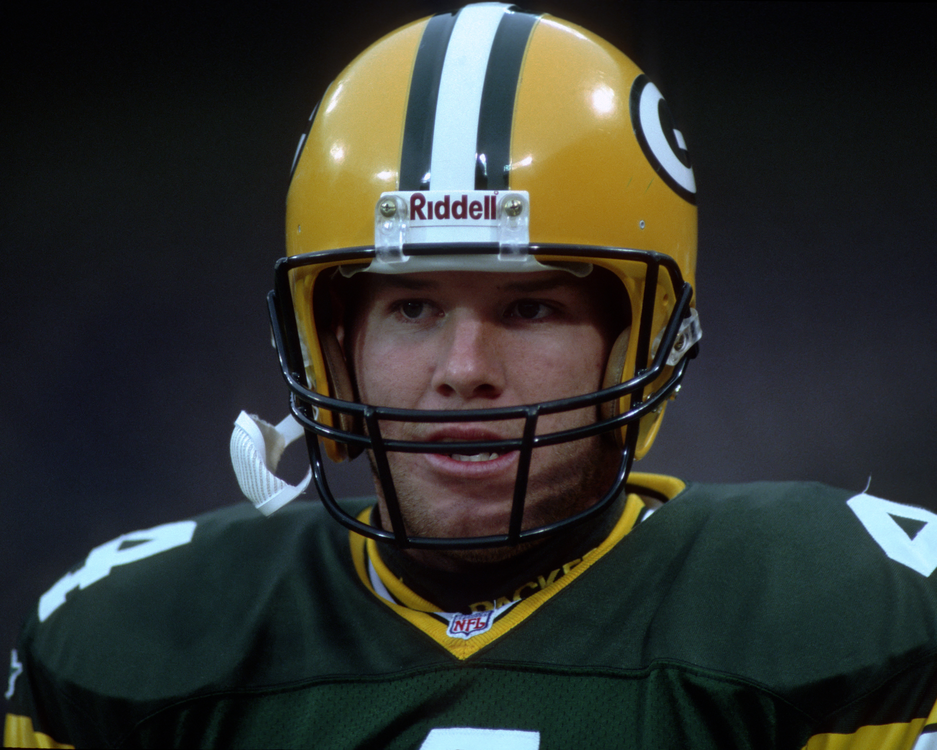 Quarterback Brett Favre of the Green Bay Packers looks on from the sideline