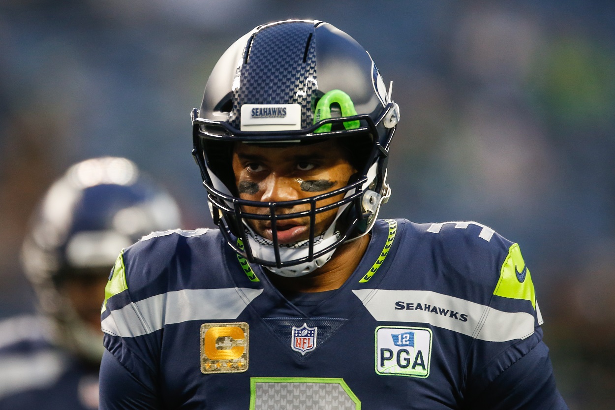 Russell Wilson on the field before the Seattle Seahawks face the Green Bay Packers.